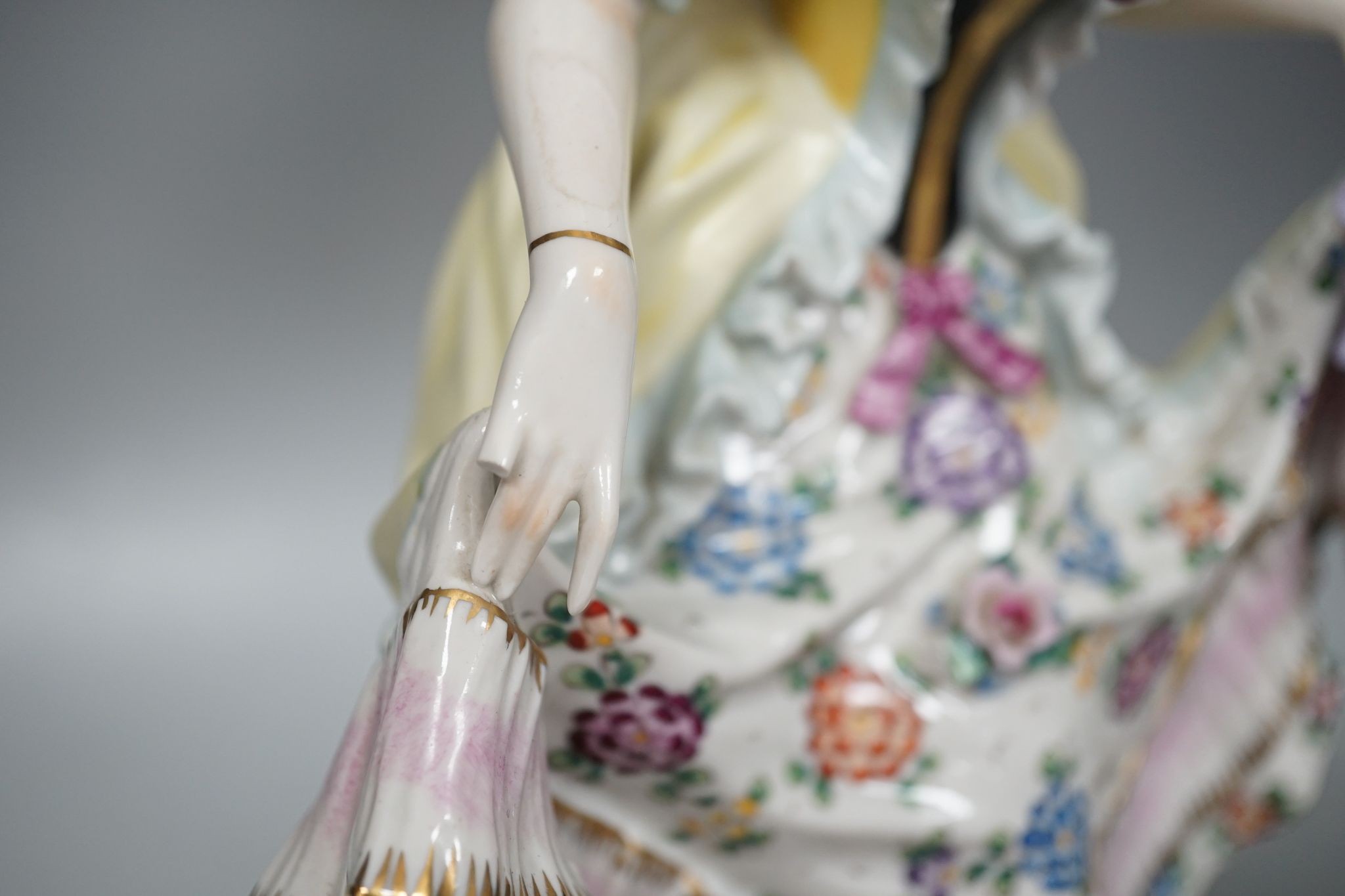 A German porcelain ‘dancing lady’ lamp, figure 29 cms high.